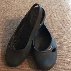 Cute woman’s Crocs with Gem stone on side.